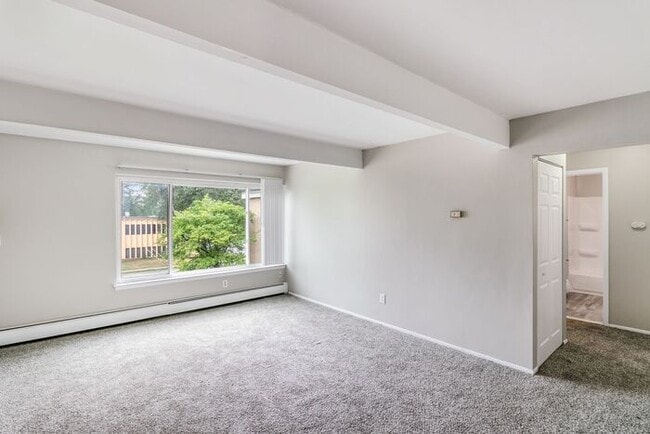 Building Photo - *Beautiful Apartment in Park Like Setting* Updated Shaker Cabinets and Appliances HEAT included
