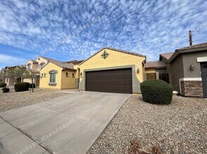 Building Photo - Well-Priced 3-Bedroom Plus Den in Gated Ru...