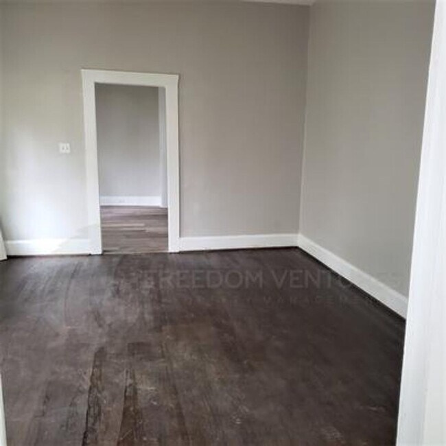 Building Photo - Spacious 3BR/2BA Rental with Hardwood Floors & Updated Living Room