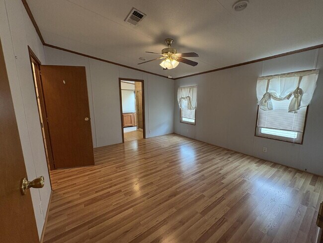 Building Photo - charming 3-bed, 2-bath home is located in the highly desired Strawberry Crest 55+ community