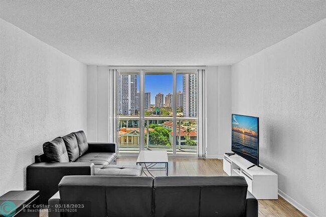 Building Photo - 19390 Collins Ave