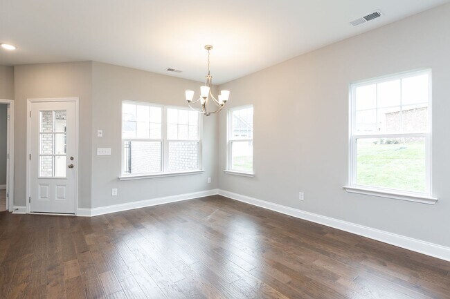 Building Photo - **BE THE LUCKY ONE TO LIVE IN THIS 2022-BUILT UPSCALE COTTAGE HOME IN THE PRESERVE AT BELLE POINTE**