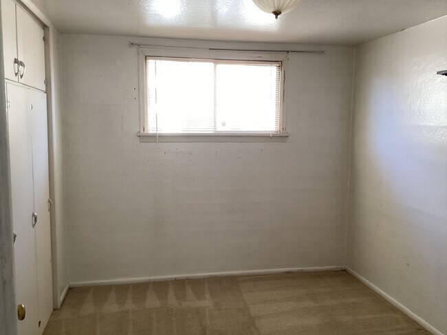 Building Photo - Charming 2BR Home with Spacious Yard, Detached Garage & Garden Oasis