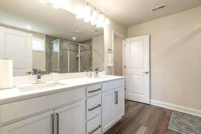 Building Photo - "Discover Spacious Living: 5-Bedroom Craftsman Home in Gated and Amenity-Rich Bretagne with Top-R...