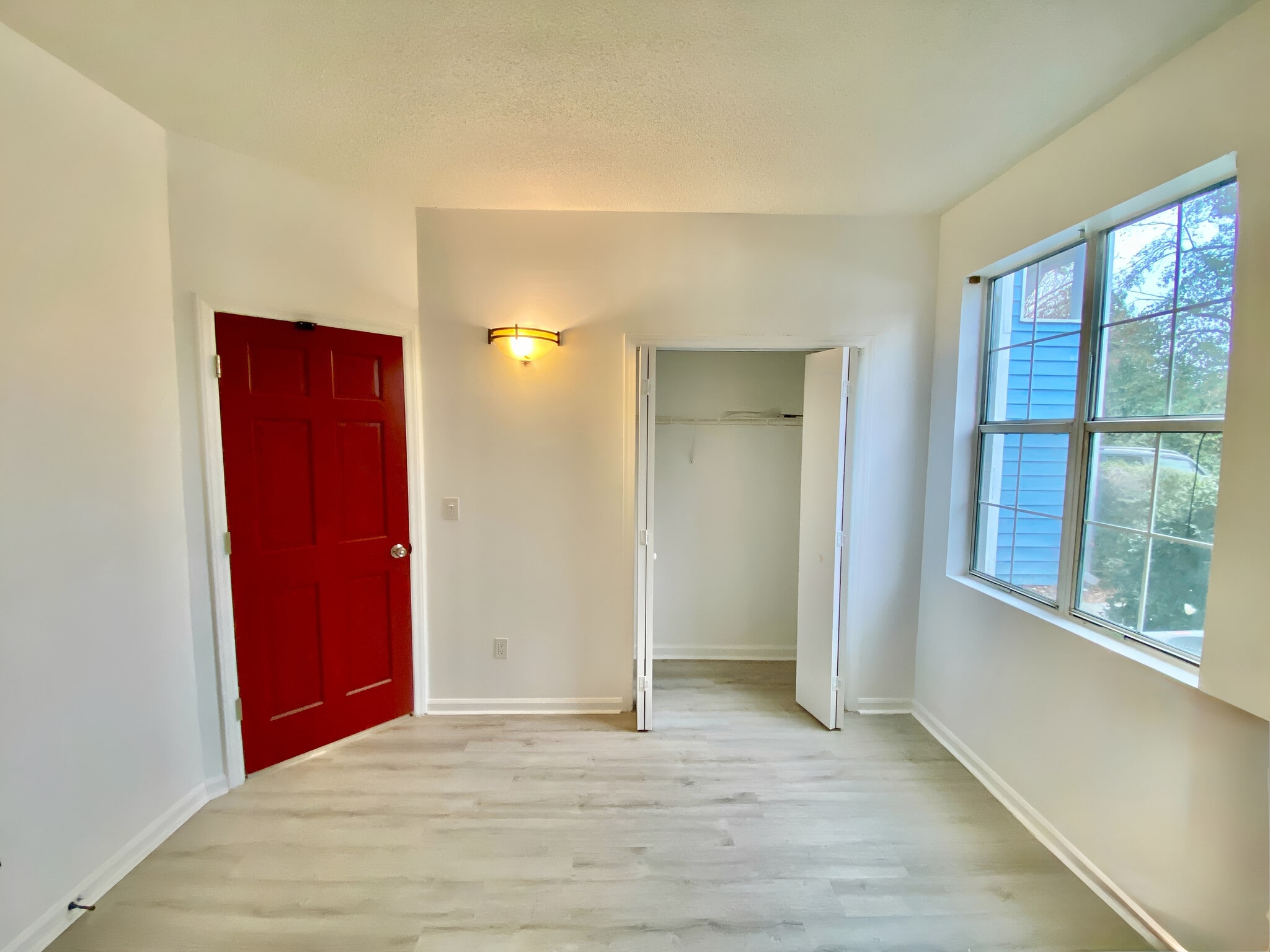Guest bedroom, walk-in closet. - 4240 Wilshire Blvd