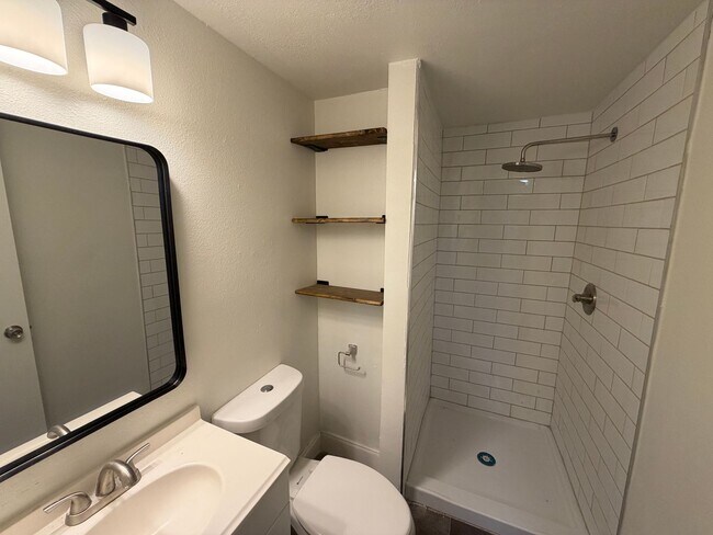 Building Photo - Charming 2BR/1BA Home with Fenced Yard & Mature Trees in Downtown Blanco!