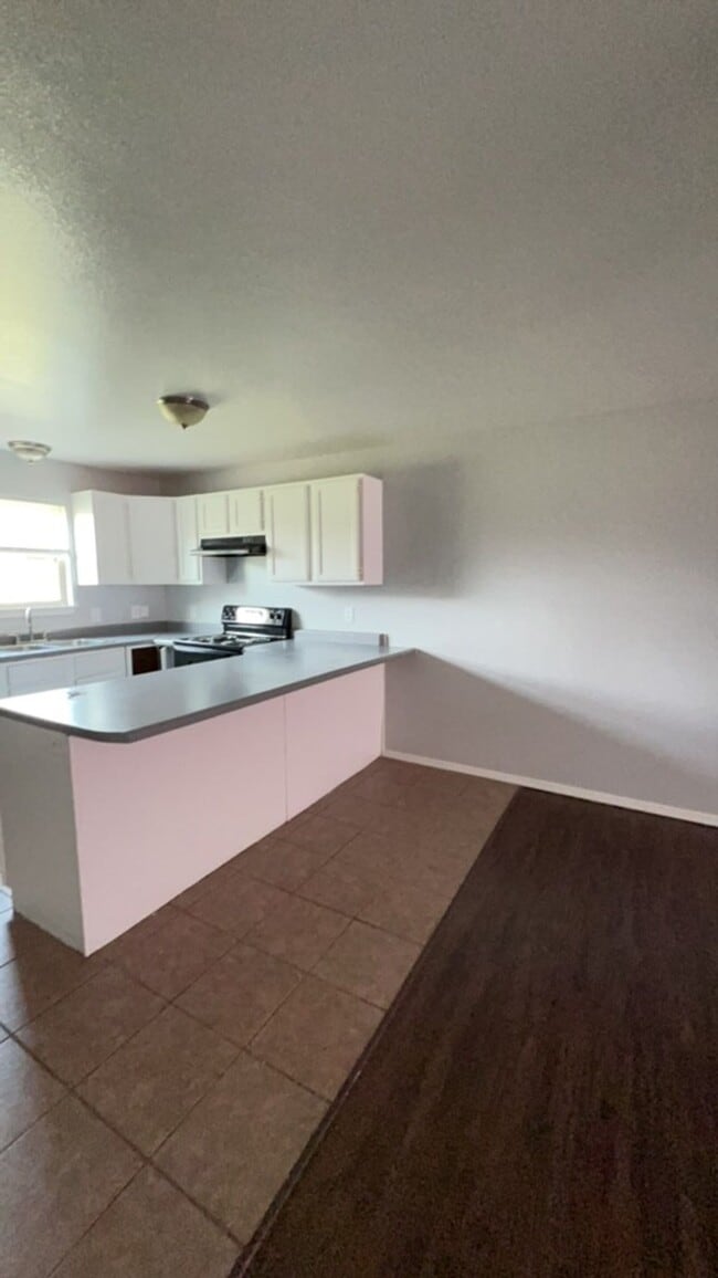 Building Photo - C&W Cheema Village