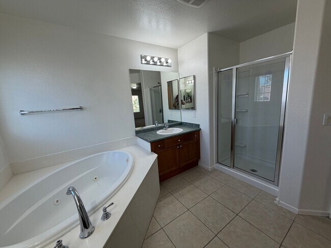 Building Photo - Discover a refreshed 4-bedroom, 2.5-bath home in Las Vegas 89149