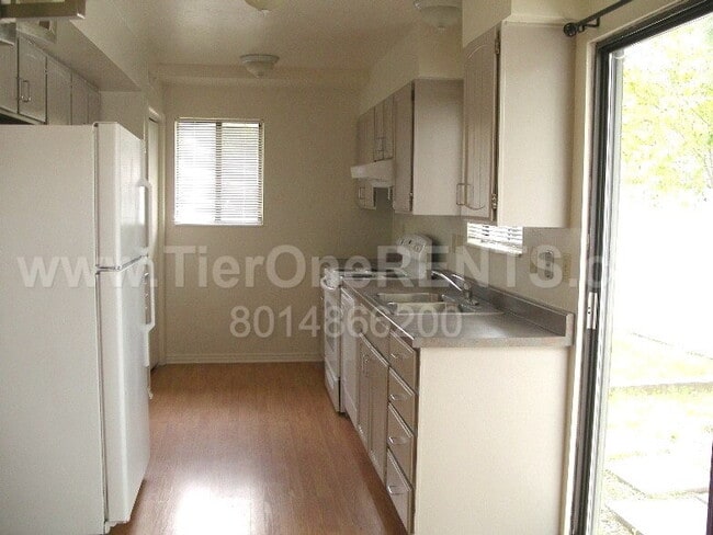 Building Photo - NO DEPOSIT option available for qualified ...