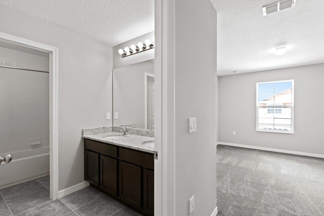 Building Photo - MOVE IN SPECIAL-4/2.5 Beautiful Energy Efficient Townhome in St. Cloud