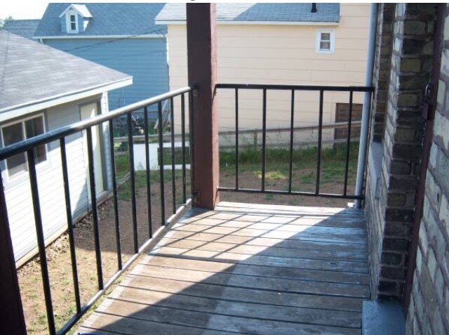 Back deck with slight view of lake and bay - 432 E 7th St