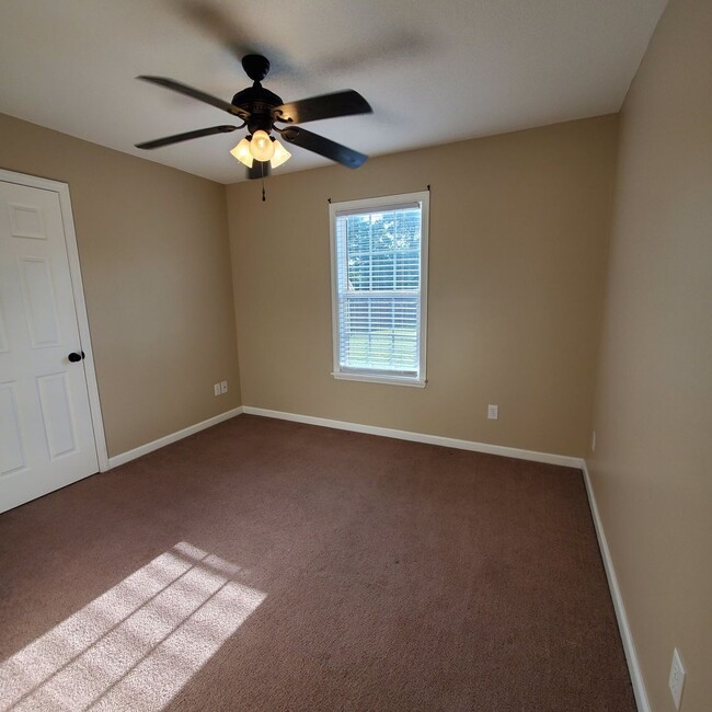 Building Photo - Tranquil Oasis: Spacious 4BR Home with Mod...