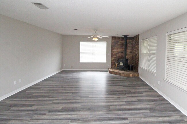 Building Photo - Live the Gulf Breeze Waterfront Life – Dock, Canal Access & Boat Lift!