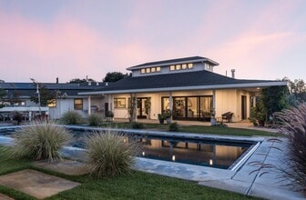 Building Photo - PURE Property Management Presents