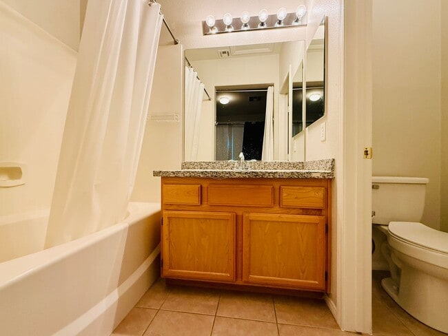 Building Photo - Immaculate and Inviting Two-Story Condo in Lone Mountain Available! 1/2 OFF THE FIRST FULL MONTH'...