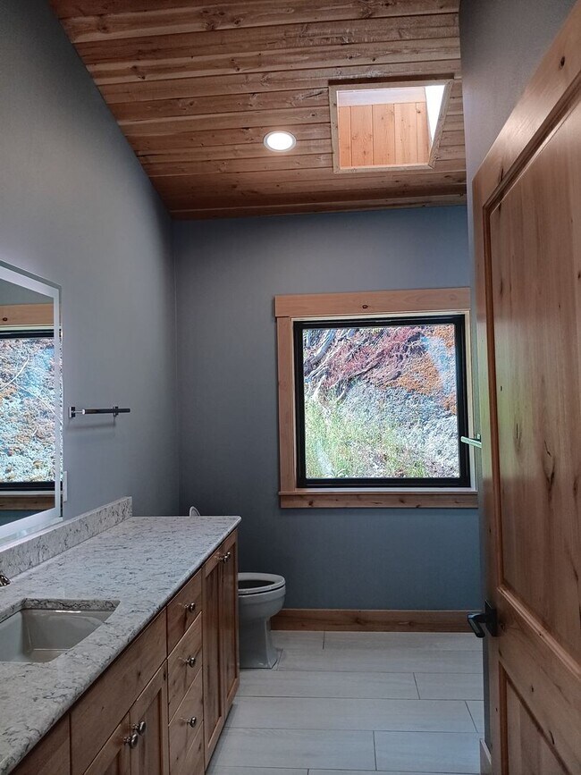 Building Photo - Beautiful Chalet Style Riverfront Property...