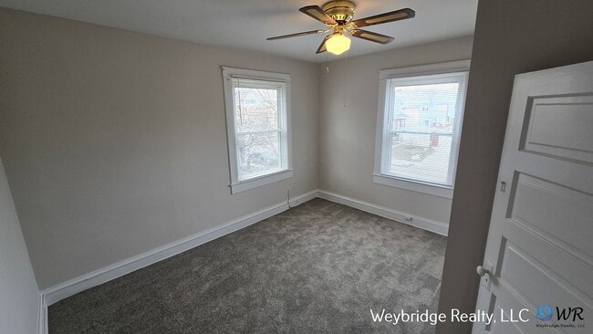 Building Photo - Charming 3BR Home in Norwood with Fenced Yard, Detached Garage & Workshop – Prime Location!