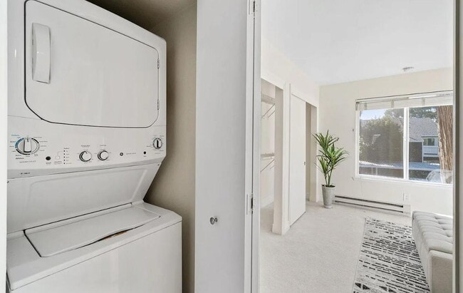 Building Photo - 1 bedroom plus loft features a functional floorplan with high ceilings