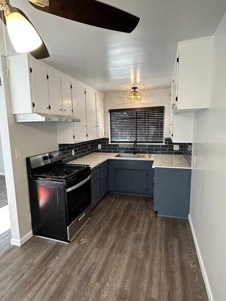 Stainless steel appliances and custom window covering - 1016 Western Ave