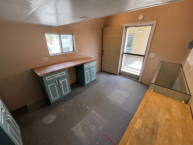 Building Photo - This inviting single-story home boasts a s...