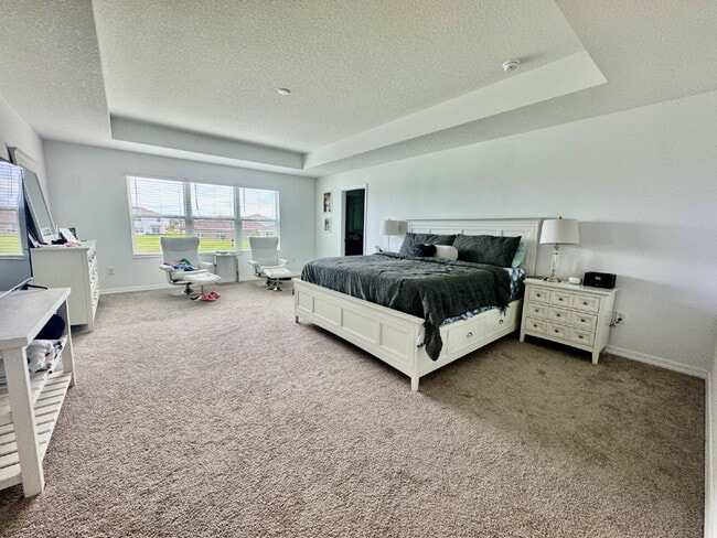 Building Photo - "Spacious 5-Bedroom Sanctuary with 4 Full Baths in Wimauma - 3,566 Sq Ft of Comfort!"