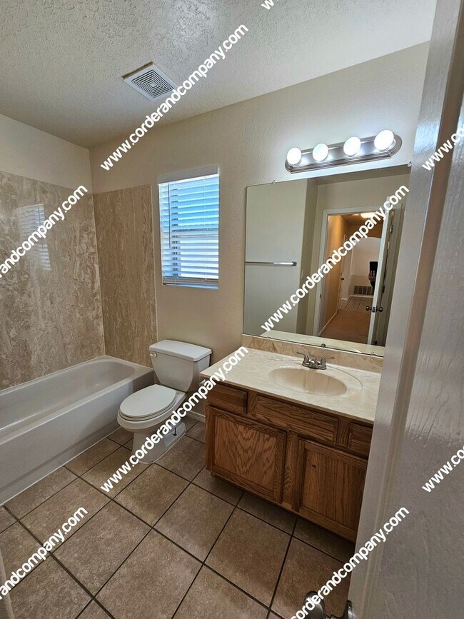 Building Photo - Custom 3 Bedroom, 2 Bathrooms, 2 Car Garage and 2,212 Sq Ft. Home with Beautiful Sandia Mountain ...