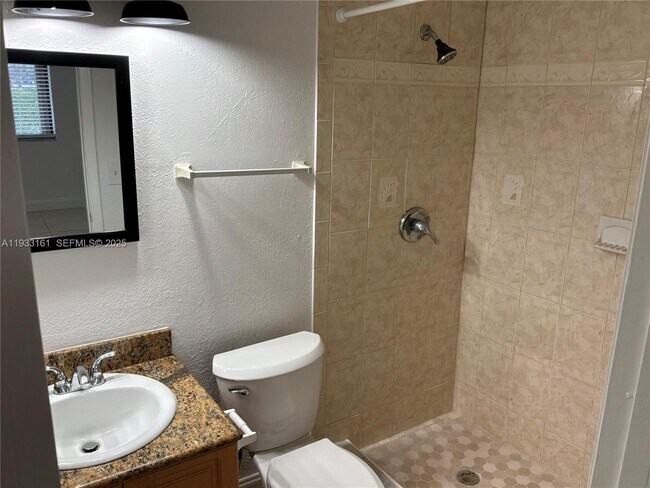 Building Photo - 6051 10th Ave N