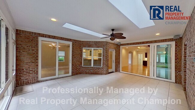 Building Photo - Custom 4BD/3BA Home with Hardwood Floors, Office, and Sunroom