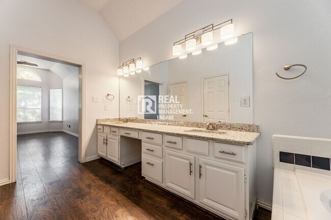 Building Photo - Recently Updated Plano Property with Modern Features and Serene Surroundings