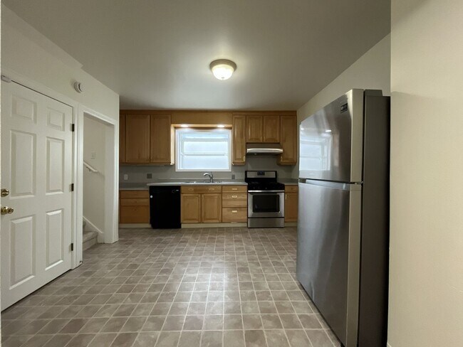 Building Photo - Character-Filled Concordia Home with Flexible Living Spaces & Gas Fireplace