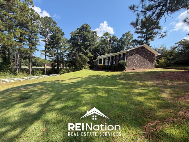 Building Photo - MASSIVE BESSEMER RENTAL! 4BR/2.5BA | High Ceilings & Brick Fireplace | 2-Car Garage!