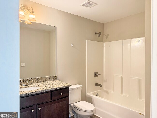 Building Photo - 6369 Woodland Station Dr