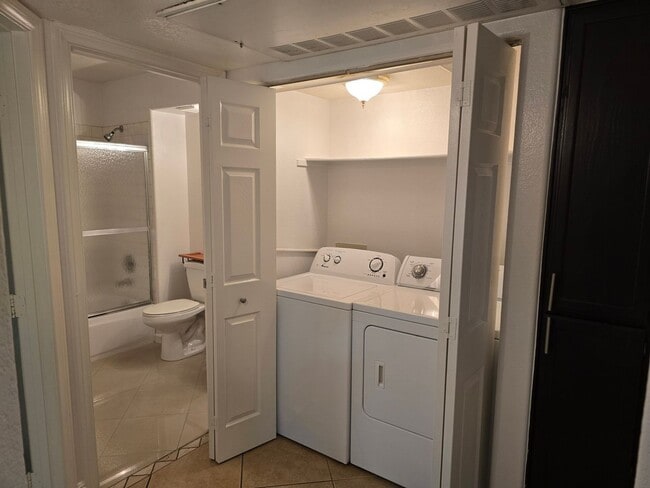 Building Photo - UPGRADED CONDO READY TO MOVE INTO!
