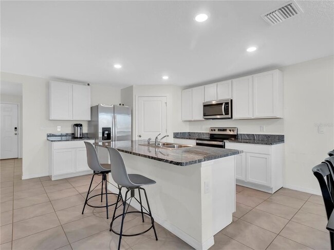 Building Photo - 5446 Logan Cave Ave