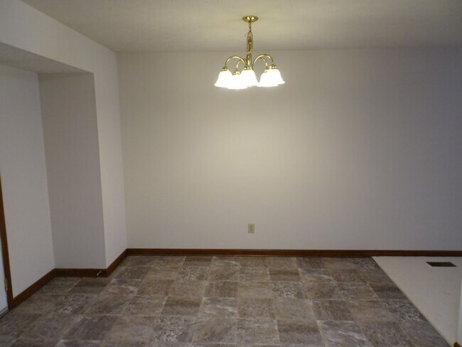 Building Photo - Great location, large wooded and fenced ya...