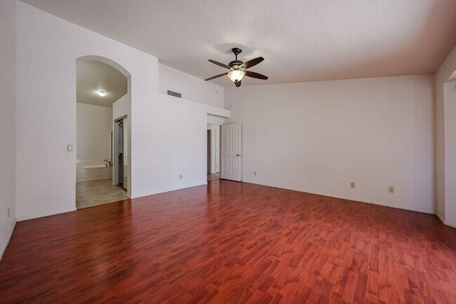 Building Photo - Welcome to this stunning 4-bedroom, 2-bath...