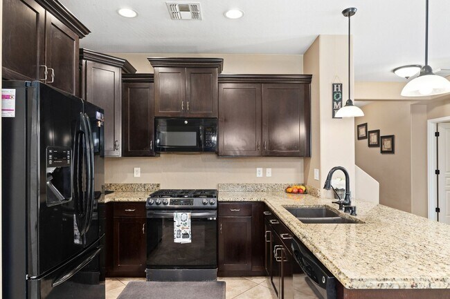 Building Photo - Welcome Home! This stunning 4 bedroom, 3 b...