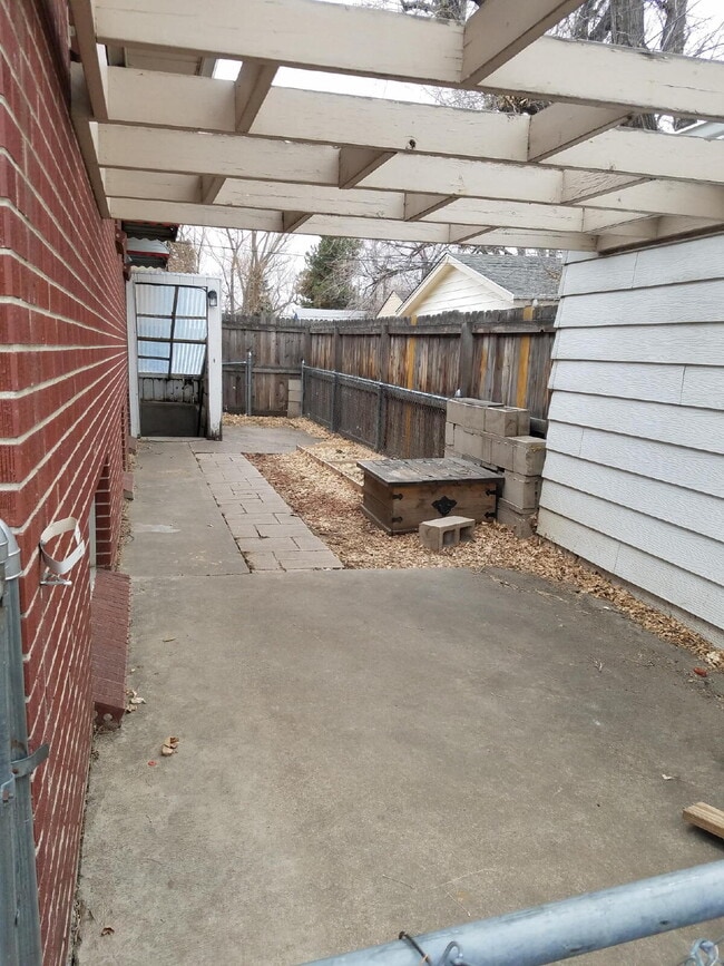 Building Photo - ***AVAILABLE NOW***  Spacious 4-Bedroom Wheat Ridge Home with Finished Garden Level and Two-Car G...