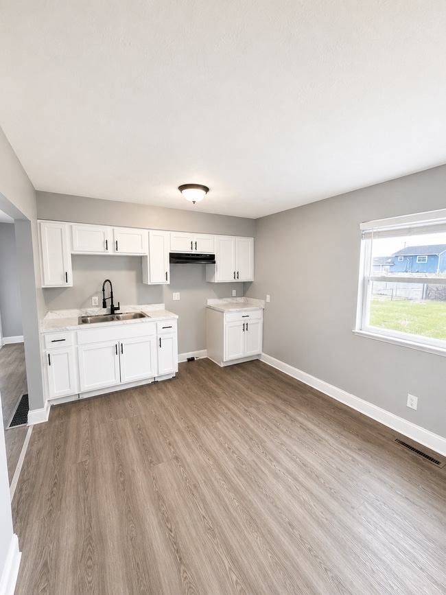 Building Photo - Stylishly Renovated 3-Bedroom Home with Finished Basement & Spacious Fenced Yard