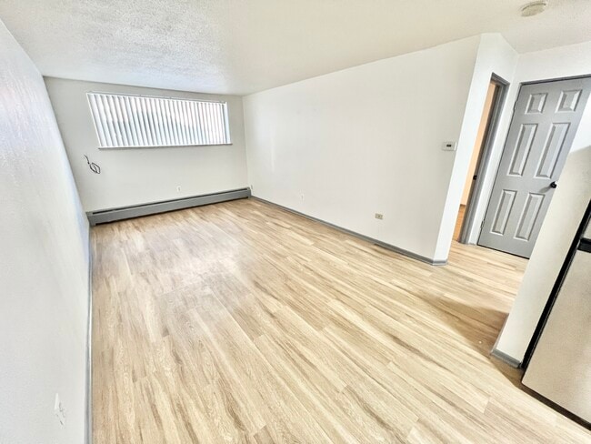 Experience the charm of this bright and inviting living space, perfect for modern living. - Melody Apartments