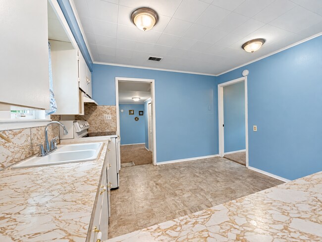 Building Photo - 6030 Cotter Ave