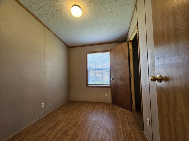 Building Photo - Own cheaper than rent