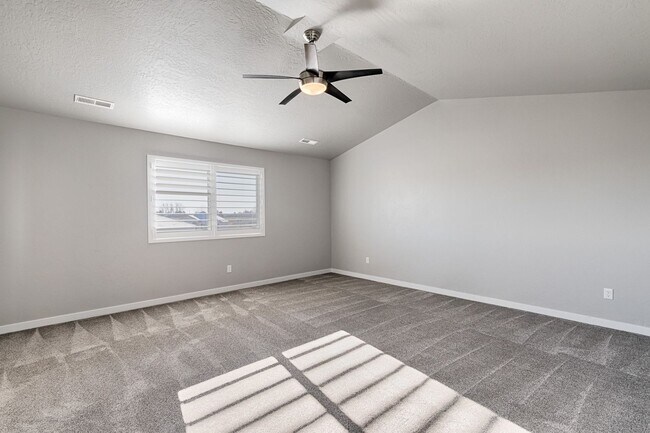 Building Photo - Custom Hunter-Douglas shutters throughout.