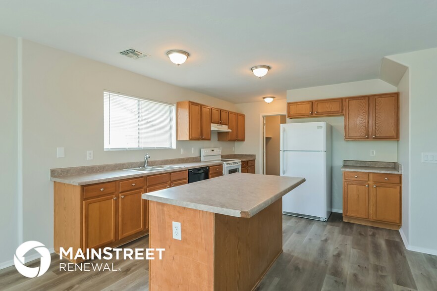 Building Photo - 5090 E Butterweed Dr
