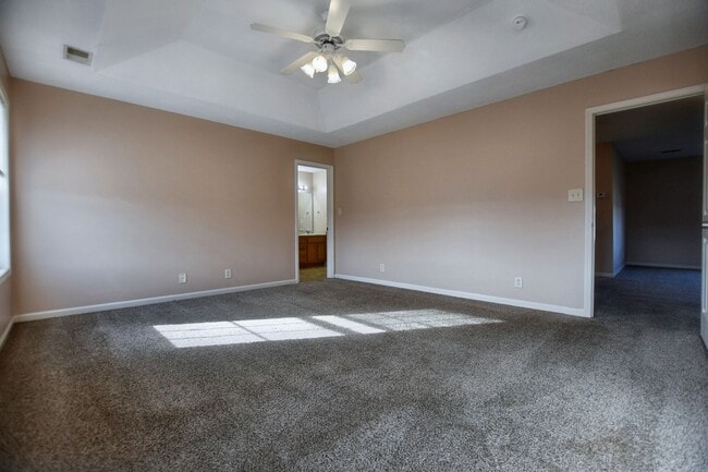 Building Photo - Pet Friendly Three Bedroom with Bonus!