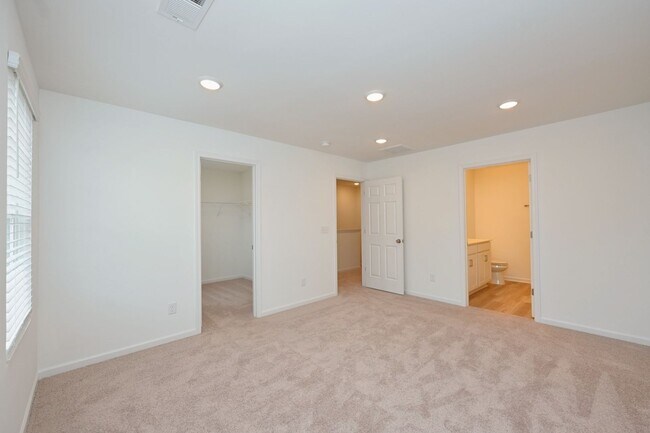 Building Photo - **BE THE LUCKY ONE TO LIVE IN THIS 2024-BUILT BRICK TOWNHOME IN THE VILLAS AT REGAL SQUARE FEATUR...