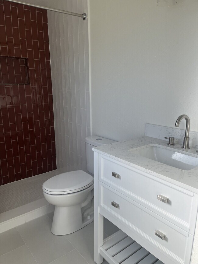 Building Photo - "Charming 4-Bedroom Coastal Retreat with 2 Baths"