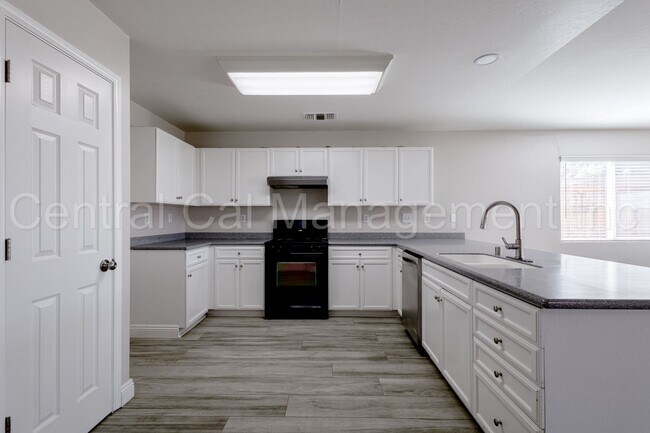 Building Photo - 4 Bedroom/2 Bath Home with Solar - $2695 p...