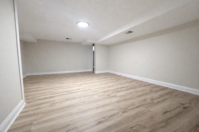 Building Photo - Updated 3BR Home with Finished Basement, & Fenced Yard
