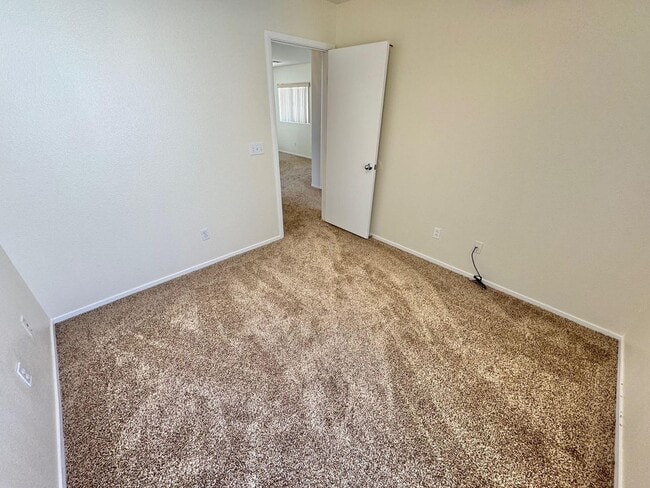 Building Photo - WELCOME TO THIS SPACIOUS 4-BEDROOM, 2.5-BA...